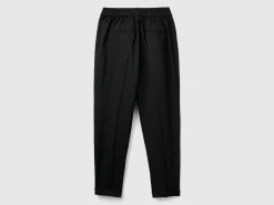 Trousers with cuff in stretch viscose blend