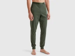 Trousers with elastic logo