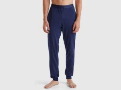 Trousers with elastic logo