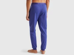 Trousers with elastic logo