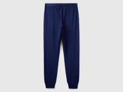 Trousers with elastic logo