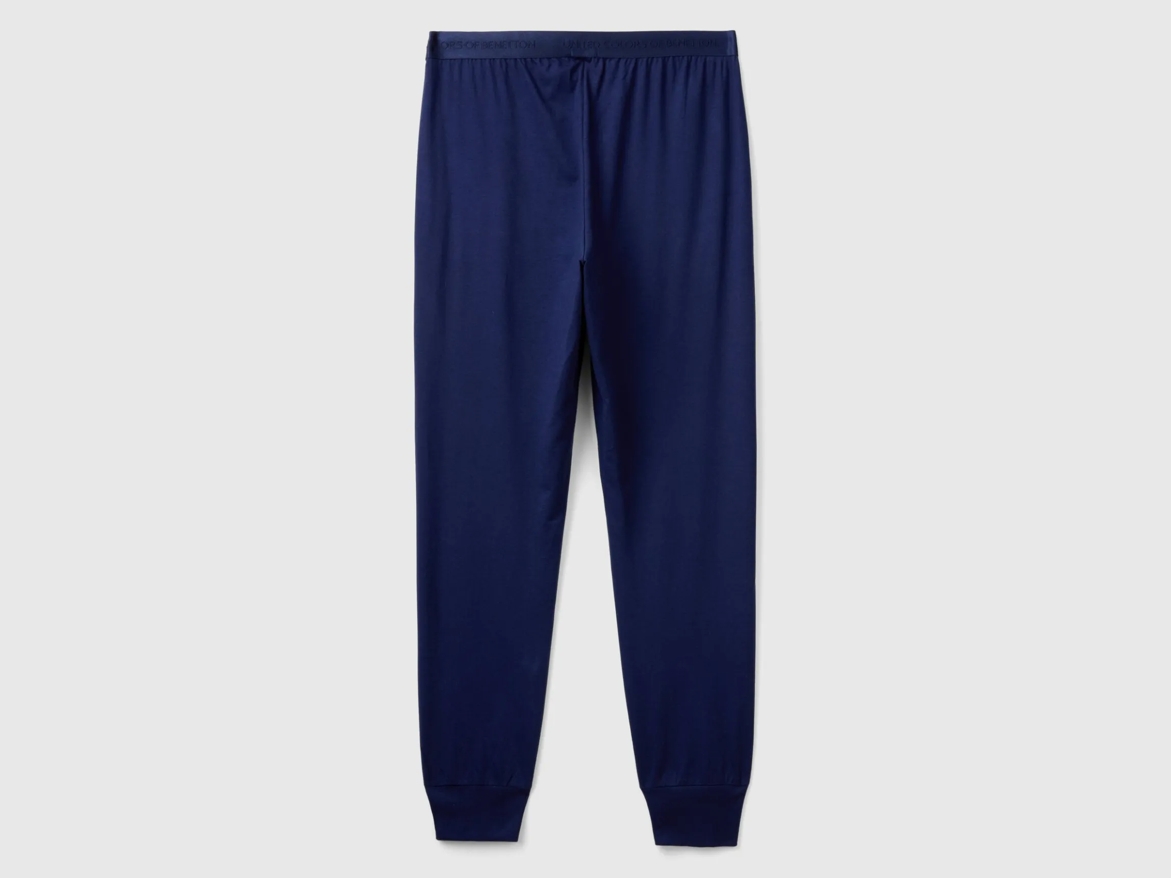 Trousers with elastic logo