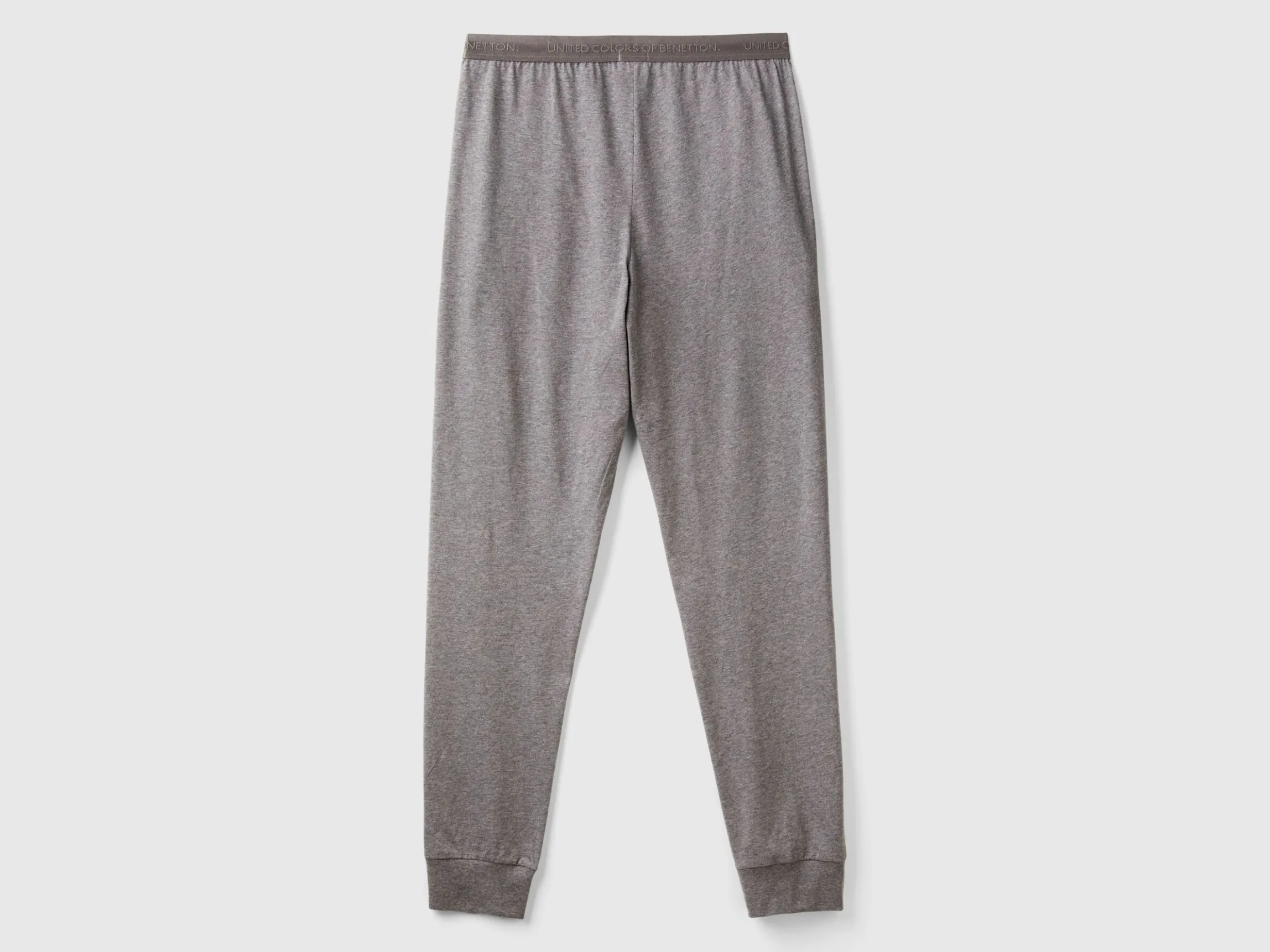Trousers with elastic logo