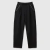 Trousers with jewel-like applique