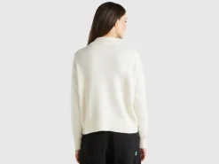 Turtleneck sweater with rhinestones