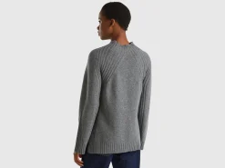Turtleneck sweater with slits