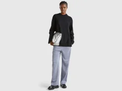 Turtleneck sweater with slits