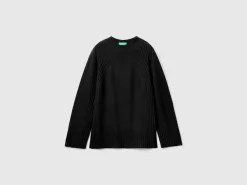 Turtleneck sweater with slits