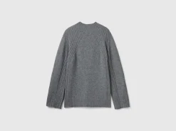 Turtleneck sweater with slits