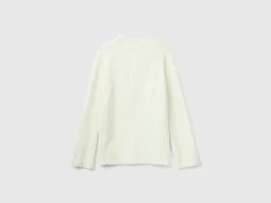 Turtleneck sweater with slits