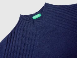 Turtleneck sweater with slits