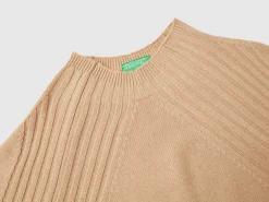 Turtleneck sweater with slits