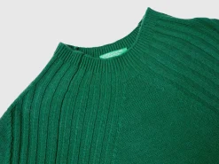 Turtleneck sweater with slits