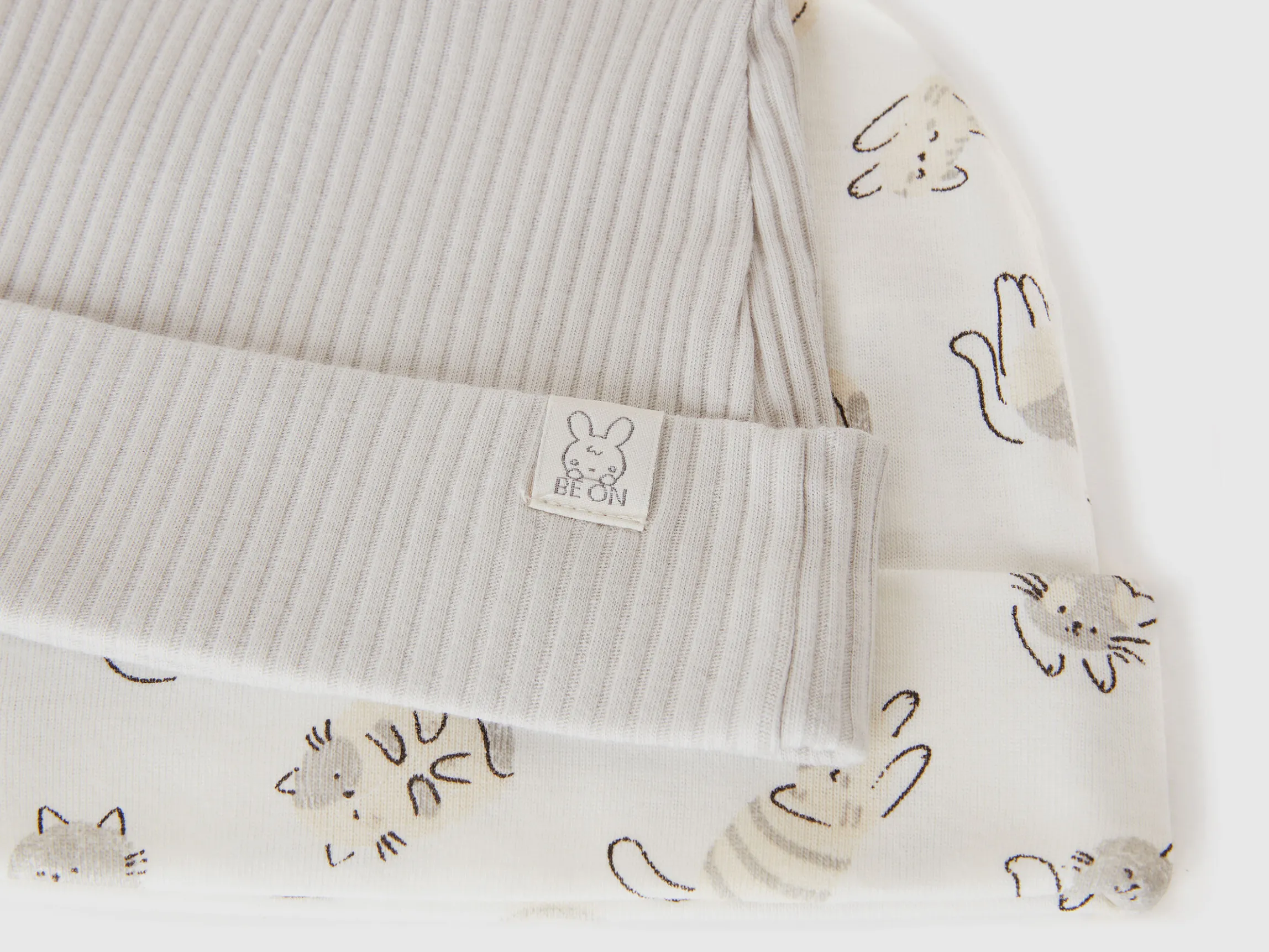 Two caps in organic cotton