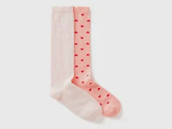 Two pairs of pink heart socks