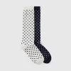 Two pairs of polka dot socks