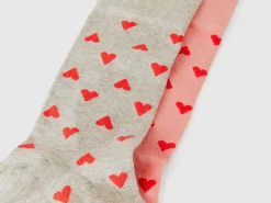 Two pairs of socks with hearts