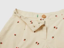 Velvet trousers with rose print