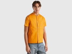 Vest with checked lining