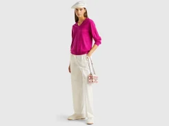 V-neck sweater in pure Merino wool