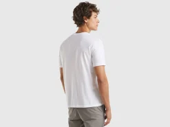 White t-shirt in organic cotton with multicolored logo