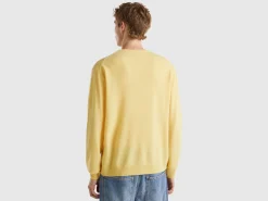 Yellow crew neck sweater in pure Merino wool