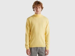 Yellow turtleneck in pure Merino wool