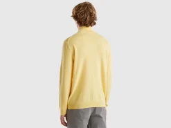 Yellow turtleneck in pure Merino wool