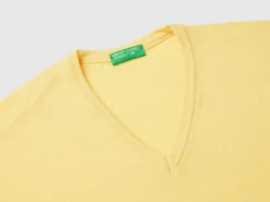 Yellow V-neck sweater in pure Merino wool